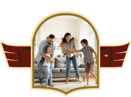 static image of family of four in living room dancing