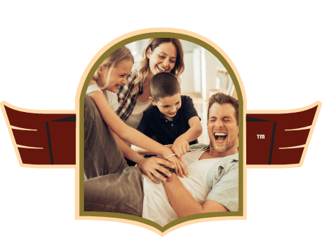 Family of 4 tickling dad on floor